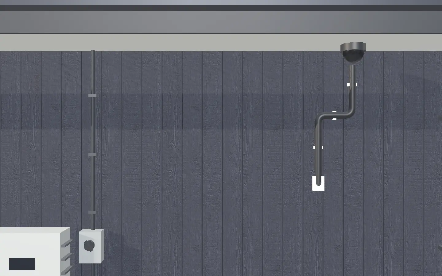 A dome camera under the eave of dark board-and-batten cladding, its cable clipped along the boards